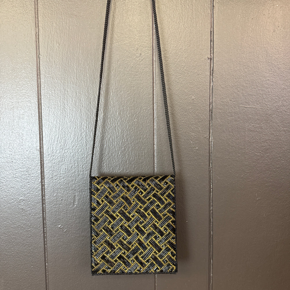 
                      
                        Vintage Basketweave Bag
                      
                    