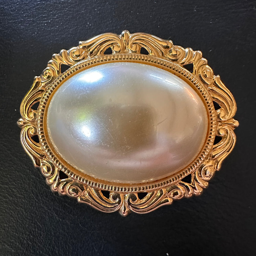 Large pearl brooch