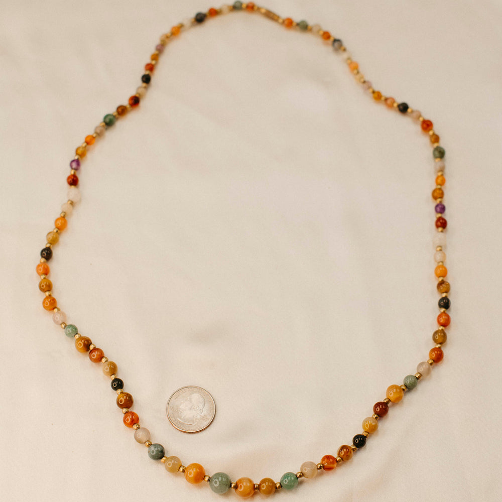 
                      
                        Vintage gemstone necklace
                      
                    