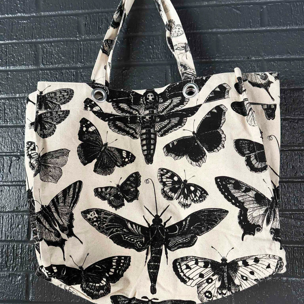 
                      
                        Grungy Grommet Tote
                      
                    