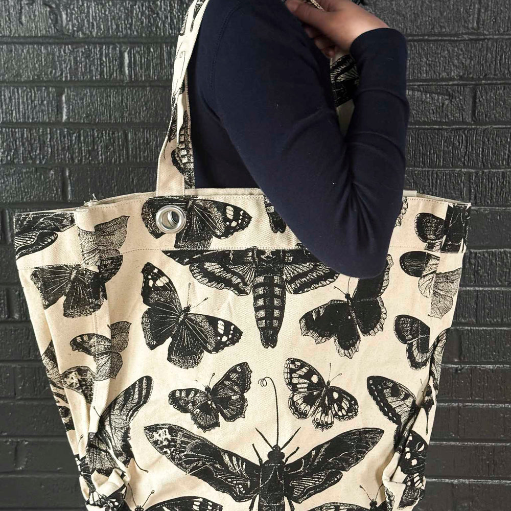 
                      
                        Grungy Grommet Tote
                      
                    