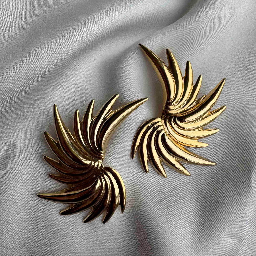 
                      
                        Vintage Gold Statement Earrings – Sculptural Wing Design
                      
                    