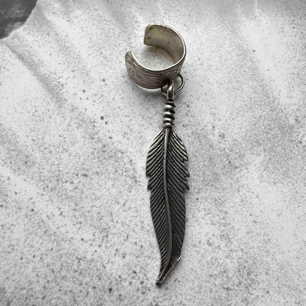 
                      
                        Vintage Silver Feather Ear Cuff – Boho Charm
                      
                    