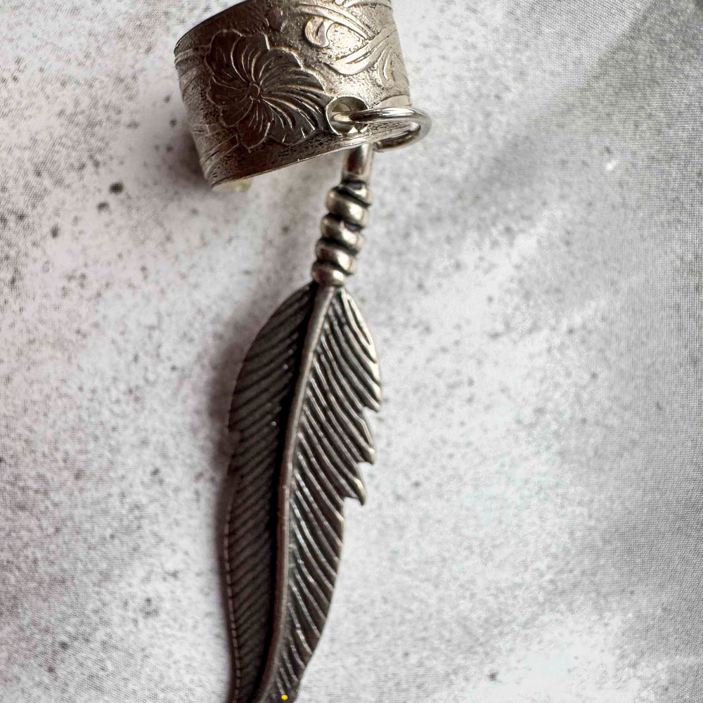 
                      
                        Vintage Silver Feather Ear Cuff – Boho Charm
                      
                    