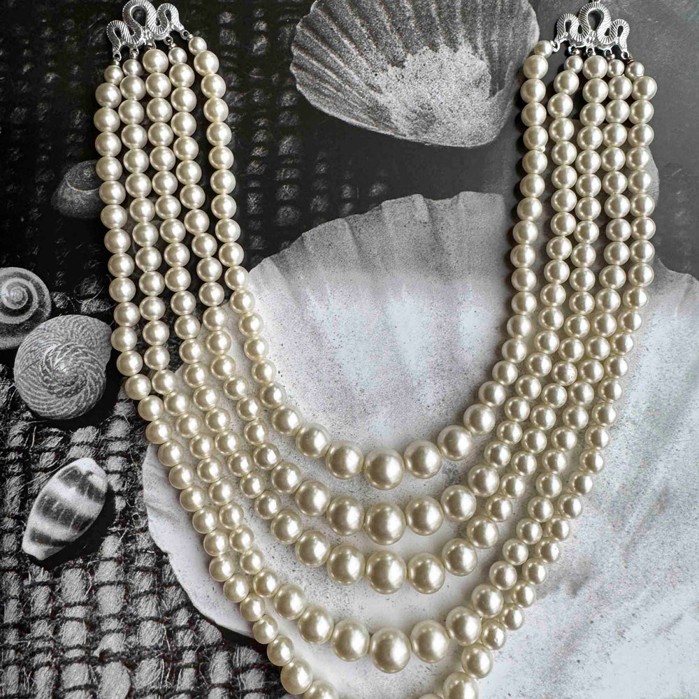 
                      
                        Vintage Multi-Strand Pearl Necklace – Classic Hollywood Glam
                      
                    