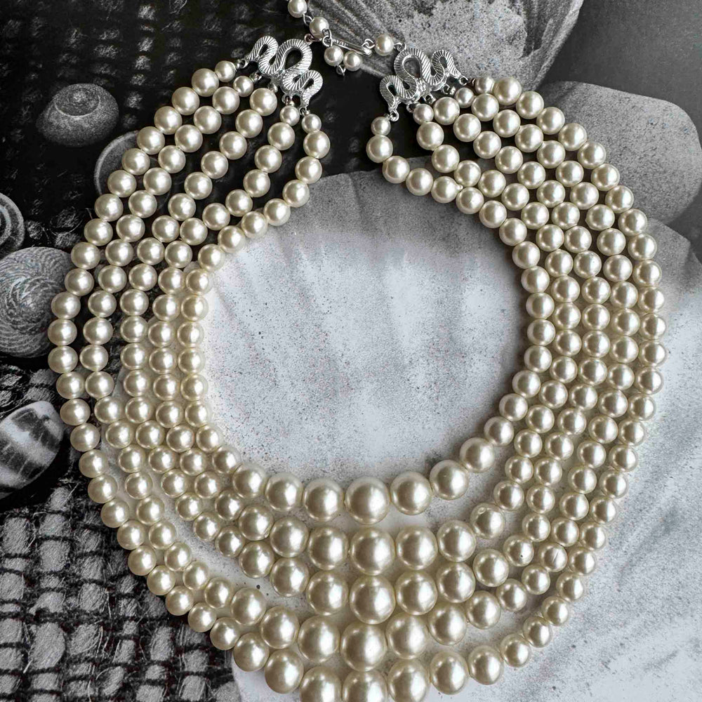 
                      
                        Vintage Multi-Strand Pearl Necklace – Classic Hollywood Glam
                      
                    