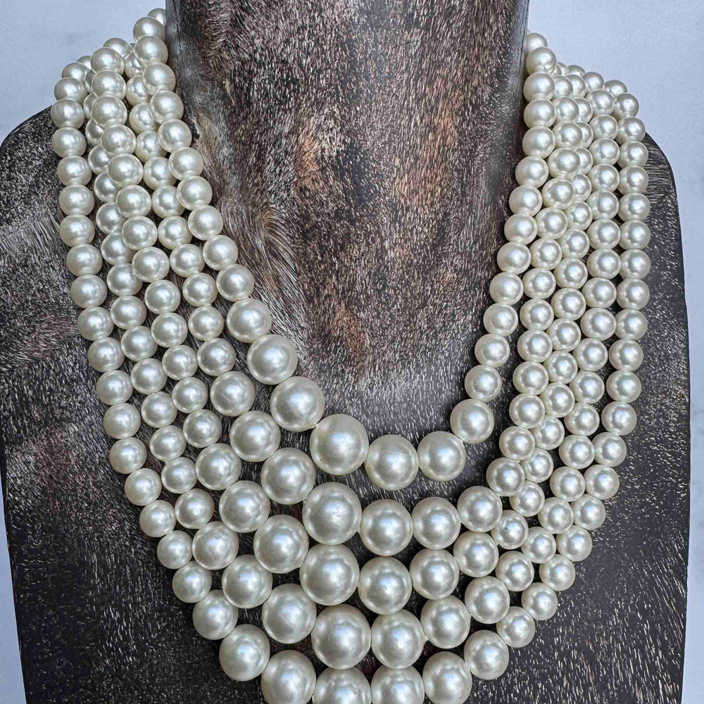 
                      
                        Vintage Multi-Strand Pearl Necklace – Classic Hollywood Glam
                      
                    